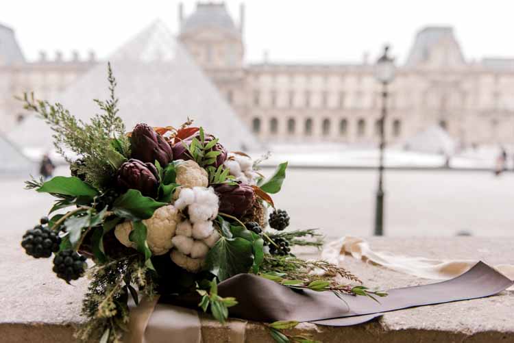 Beautiful bouquet displayed in Paris during a winter engagement photoshoot